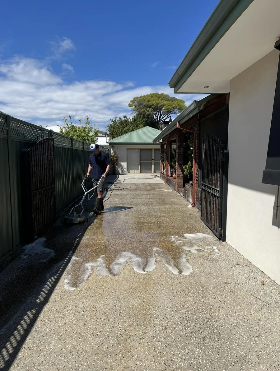 PPS technician pressure cleaning a Perth driveway